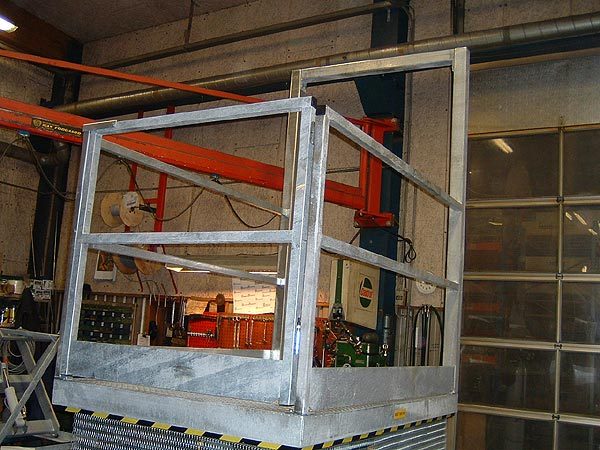 Corrosion resistant Scissor Lift Table with goal post style safety barrier and electrically interlocked gates
