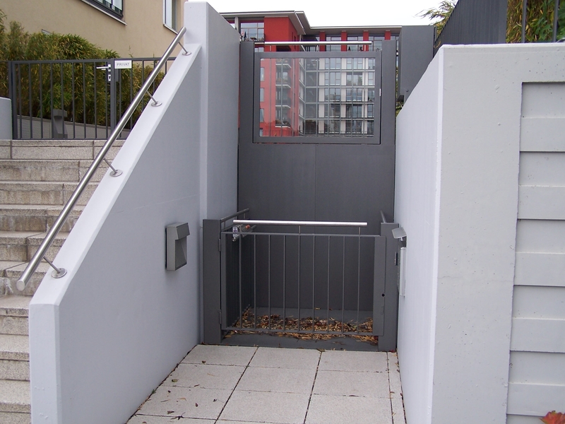 Disabled wheelchair access lift with gates