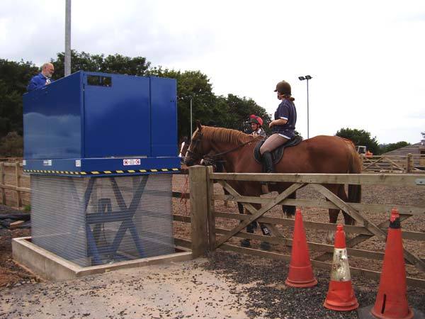 Lift table to help less abled riders get onto their horses