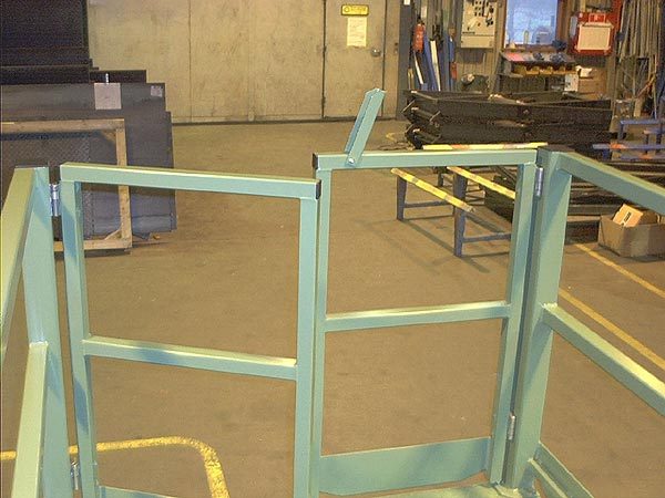 Scissor Lift Table with simple inward opening bi-parting safety gates and Bernstein SHS electrical interlocks