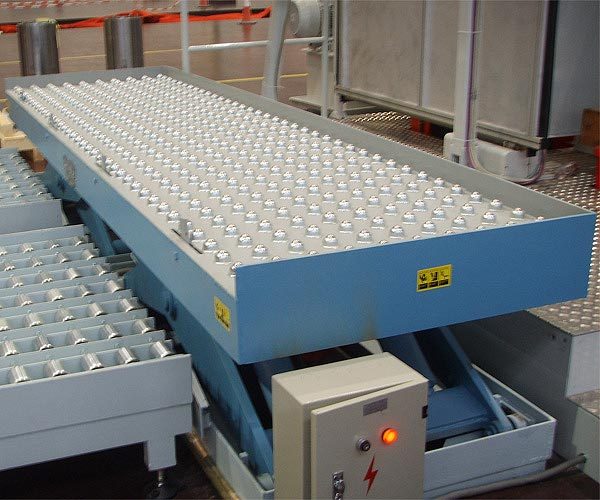 Scissor Lift with ball top transfer table integrated with feed and off-take conveyors (Section 1)